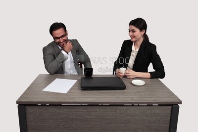 Photo of a businessman and a businesswoman sitting in the office discussing the work, business development and partnerships, business meeting, Model