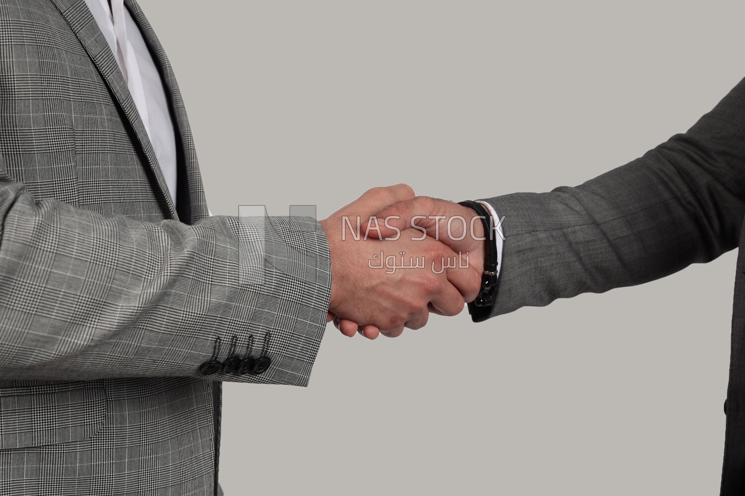 Photo of two businessmen shaking hands, business development and partnerships, business meeting, Model