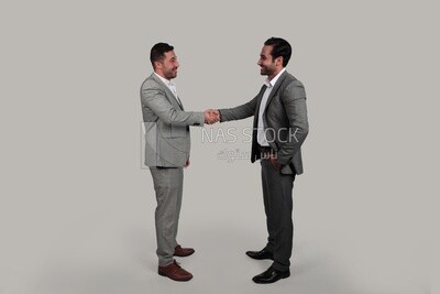 Photo of two businessmen shaking hands, business development and partnerships, business meeting, Model