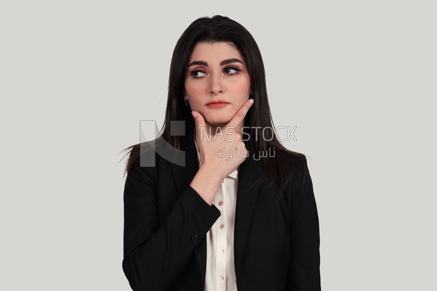 Photo of a businesswoman in formal wear standing looks like she is thinking, business development and partnerships, business meeting, Model