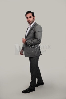 Photo of a businessman with a formal suit standing on a white background, business development and partnerships, business meeting, Model