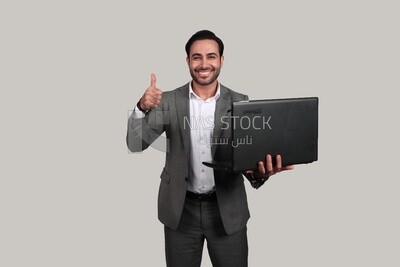 Photo of a businessman with a formal suit holding a laptop, business development and partnerships, business meeting, Model