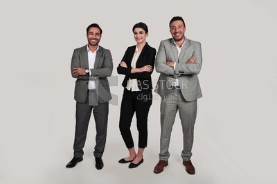 Photo of a businesswoman and two businessmen standing with crossed hands, business development and partnerships, business meeting, Model
