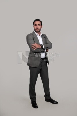 Photo of a businessman in a formal suit with crossed hands, business development and partnerships, business meeting, Model