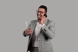 Photo of a businessman with a formal suit talking on his phone, business development and partnerships, business meeting, Model