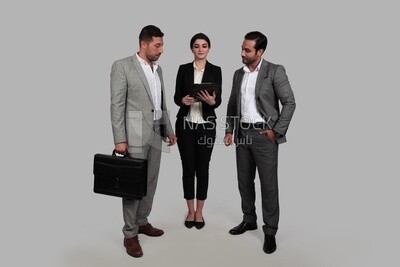 Photo of a businesswoman and two businessmen standing together checking work, business development and partnerships, business meeting, Model