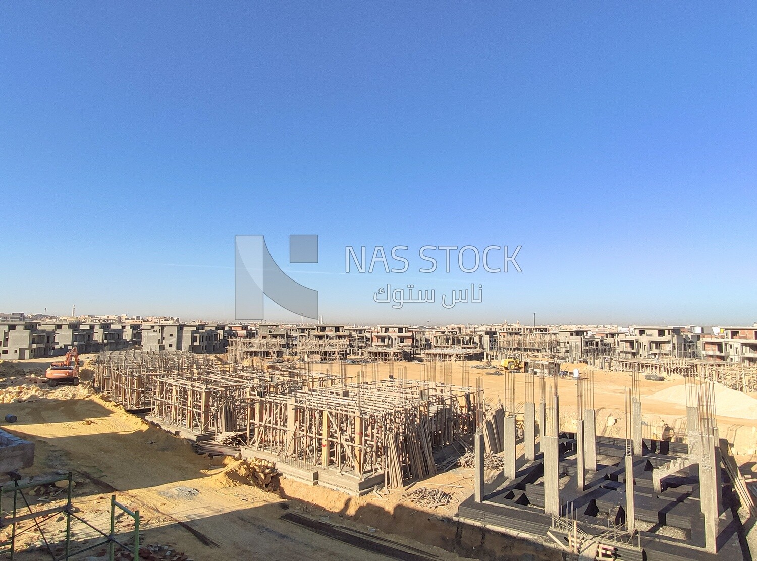 Construction site with a group of concrete buildings and buildings under construction