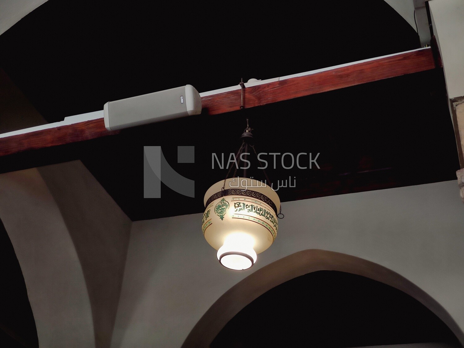 Islamic style lamp hanging in a mosque