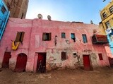 Old house painted pink in one of Cairo&#39;s popular neighborhoods