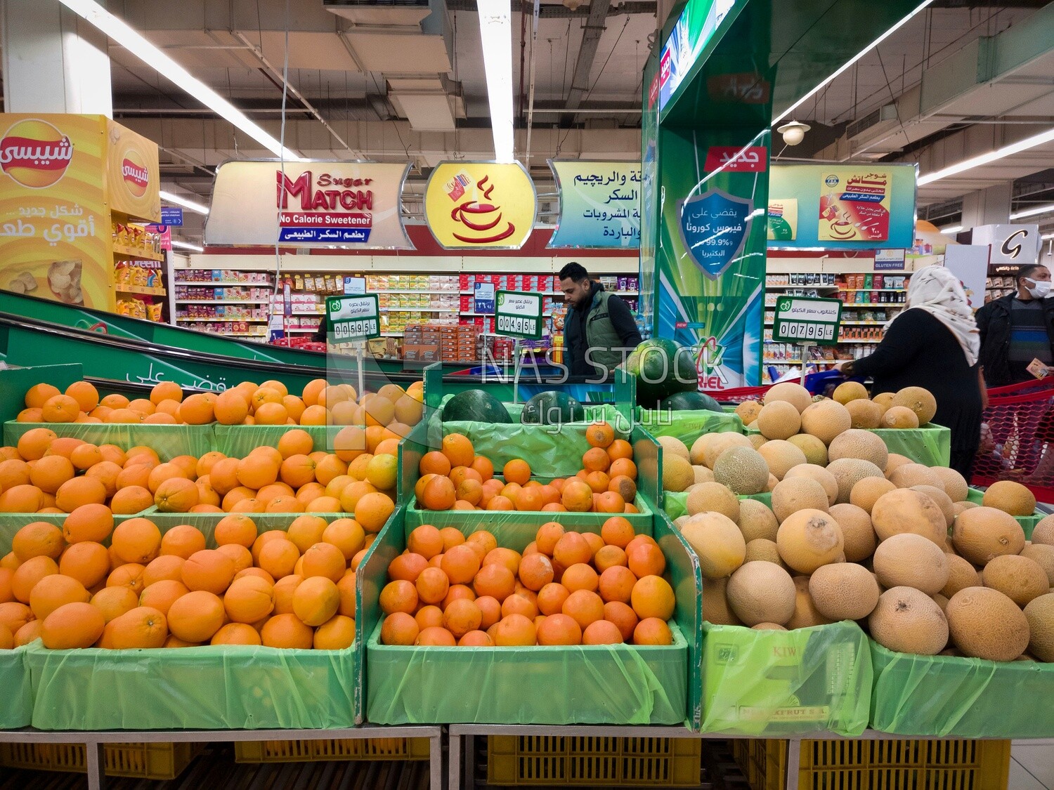 Orange and cantaloupe boxes in the supermarket