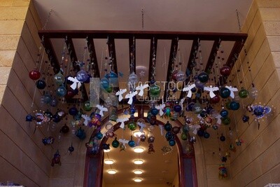 Collection of hanging ceramic decorations and macrames in one of the ceramic workshops