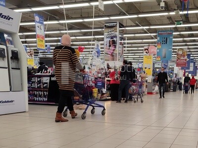Visitors in electrical appliances section