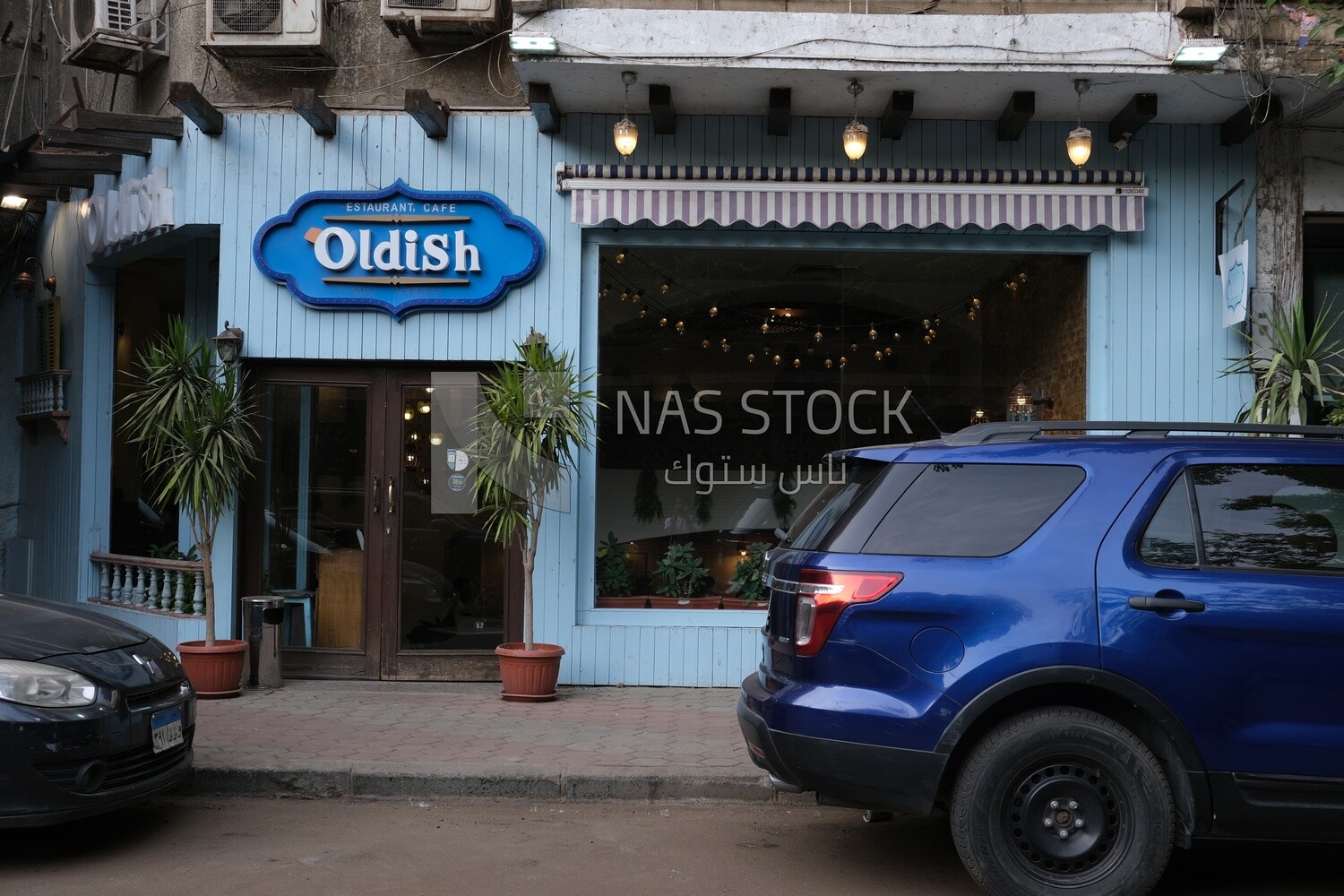 The entrance of a cafe in Zamalek,  the Nile island in Egypt, oldish cafe