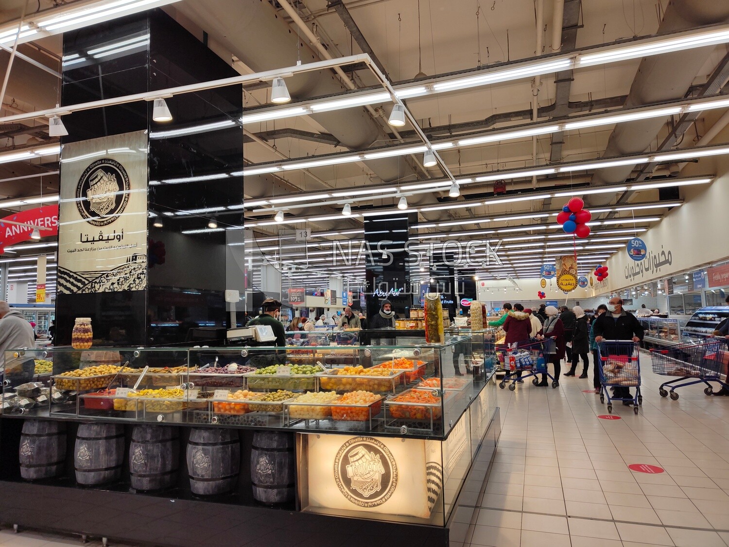 Visitors in pickles and baked section