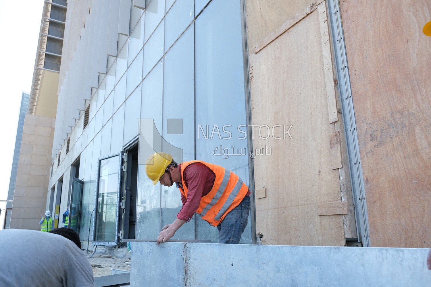 Engineers working in a building site at the new administrative capital, construction