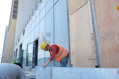 Engineers working in a building site at the new administrative capital, construction