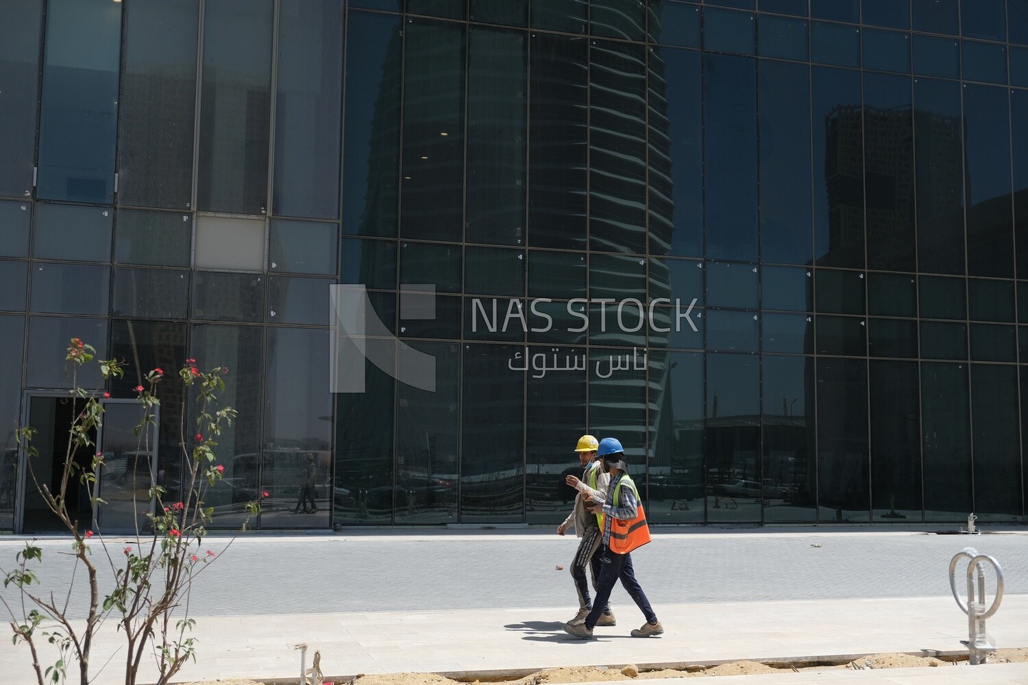Engineers working in a building site at the new administrative capital, construction