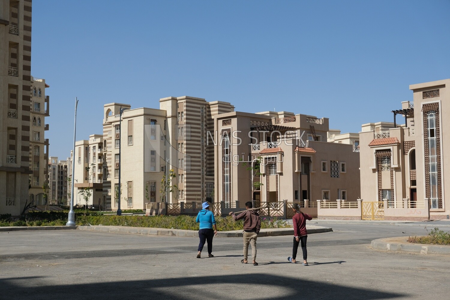 Engineers working in a building site at the new administrative capital, construction