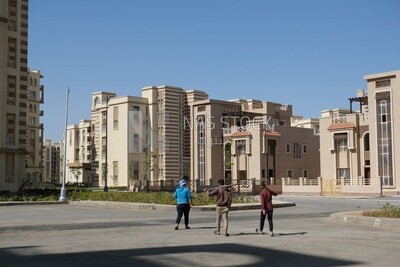 Engineers working in a building site at the new administrative capital, construction