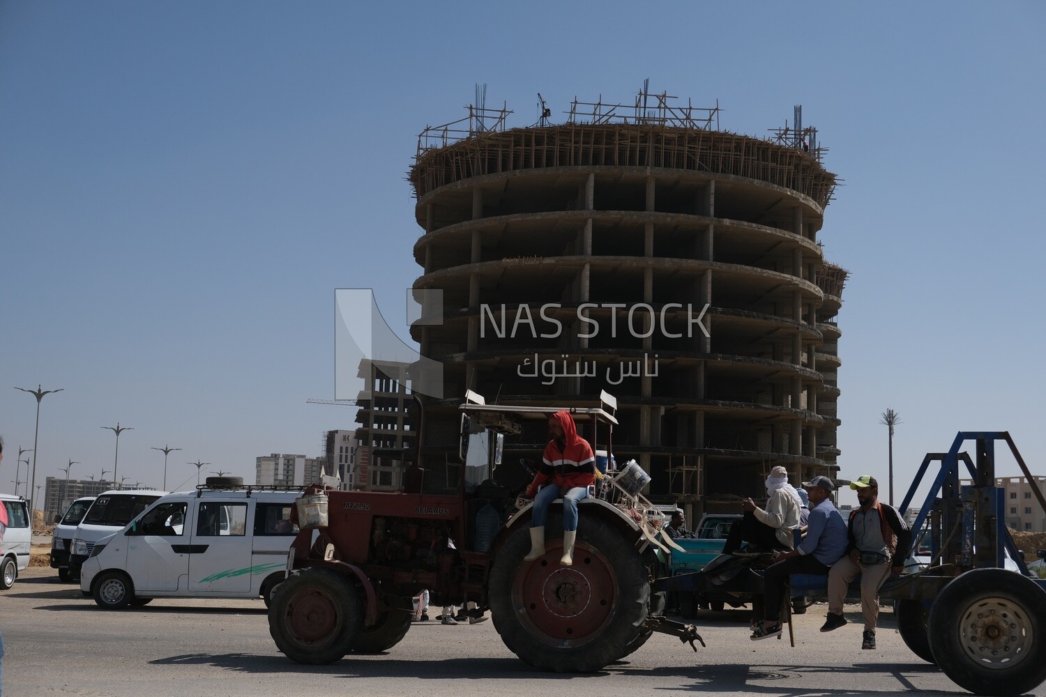 Engineers working in a building site at the new administrative capital, construction