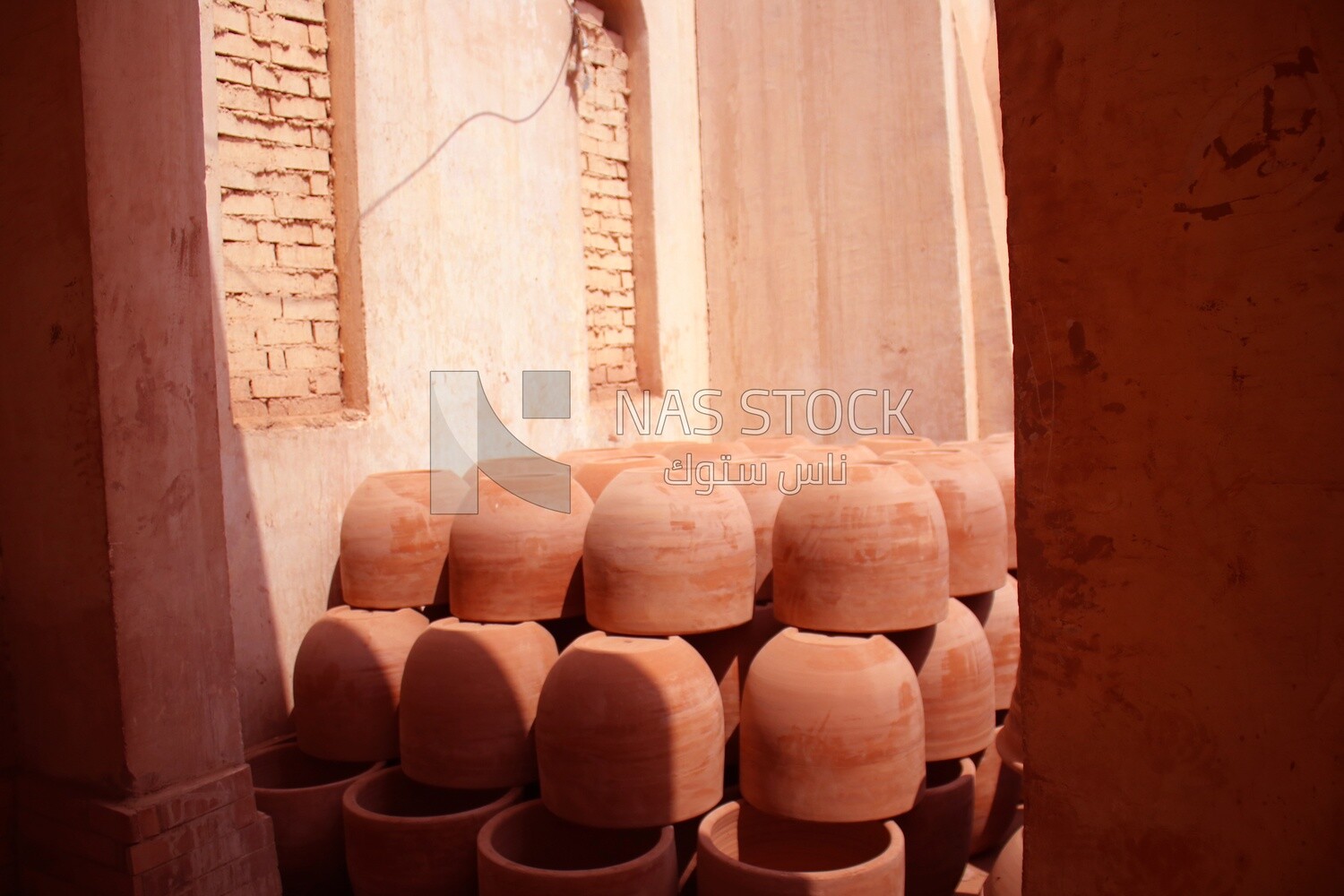 Group of pottery pots left in the sun to dry