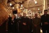 Imam of the mosque praying with people Worshipers praying in a mosque, performing the obligatory prayer in the mosque, worship and draw close to God