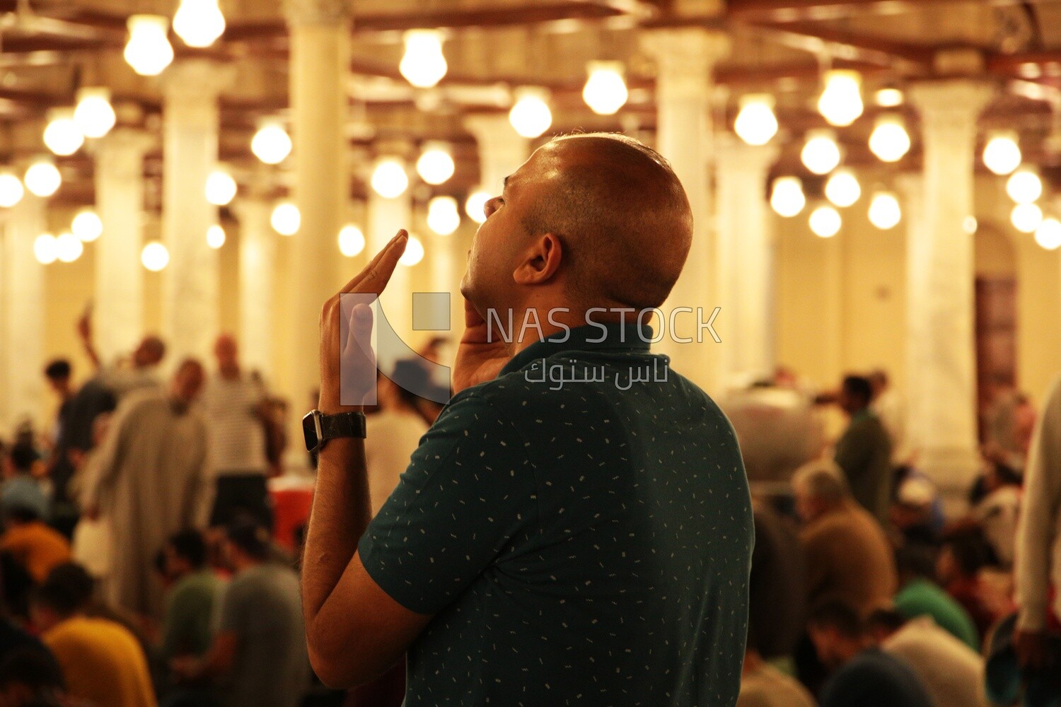 Man in the mosque, praying to God, praying on the prayer rug, performing the obligatory prayer in the mosque, worship and draw close to God