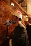 Imam of the mosque praying with people Worshipers praying in a mosque, performing the obligatory prayer in the mosque, worship and draw close to God