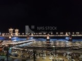 Stunning view of the Alexandria seashore in the evening with the illuminated Stanley Bridge