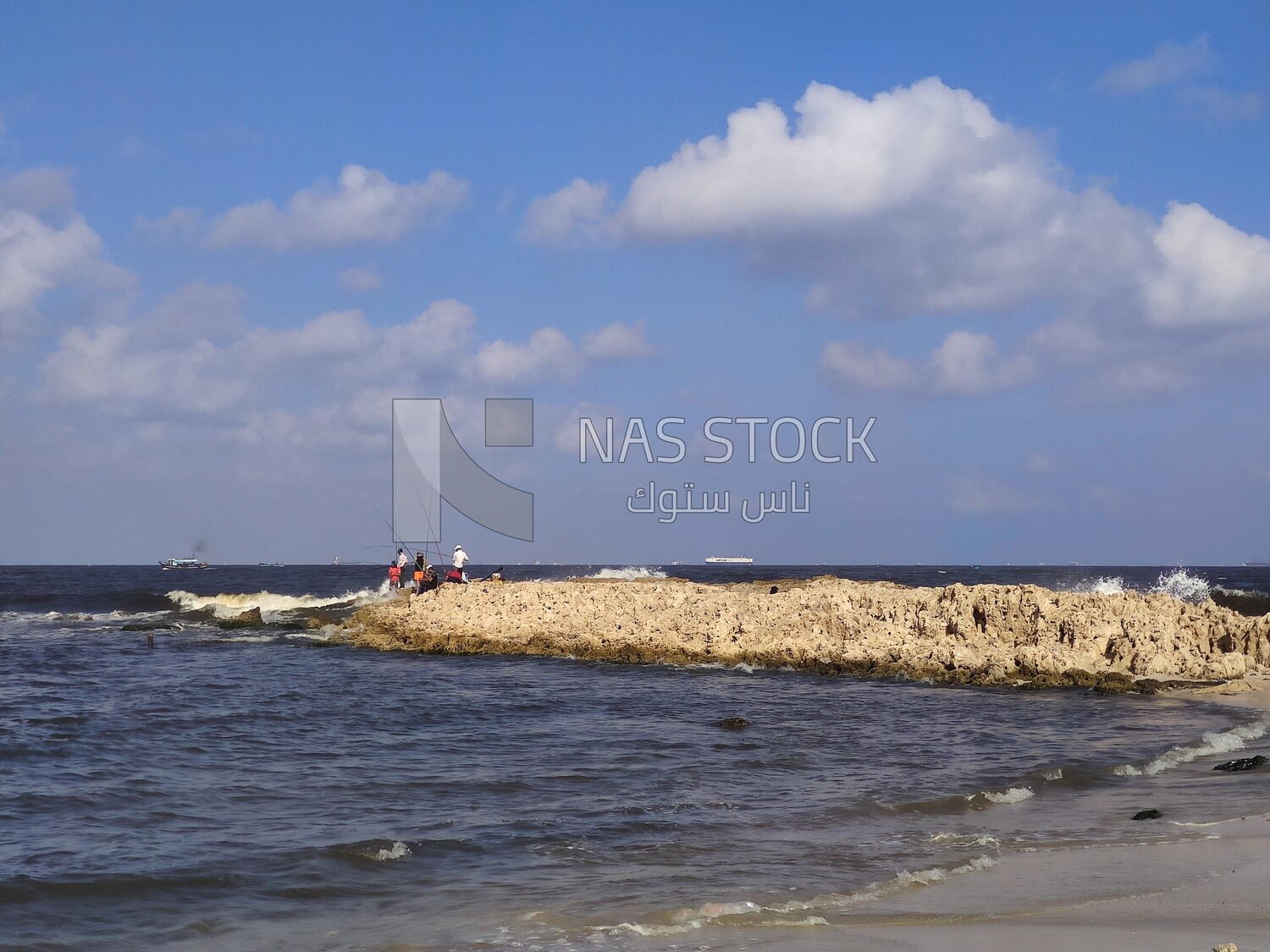Fishermen enjoying fishing in the Alexandria Sea ,Egypt