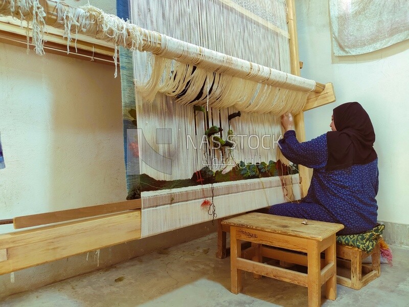 Egyptian woman weaving wall carpets Ramses Wissa Wassef Centre