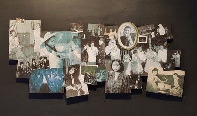 Some pictures of the Egyptian singer Om Kulthum hang on a wall in a museum named after her &quot;Om Kulthum Museum&quot; , Egypt