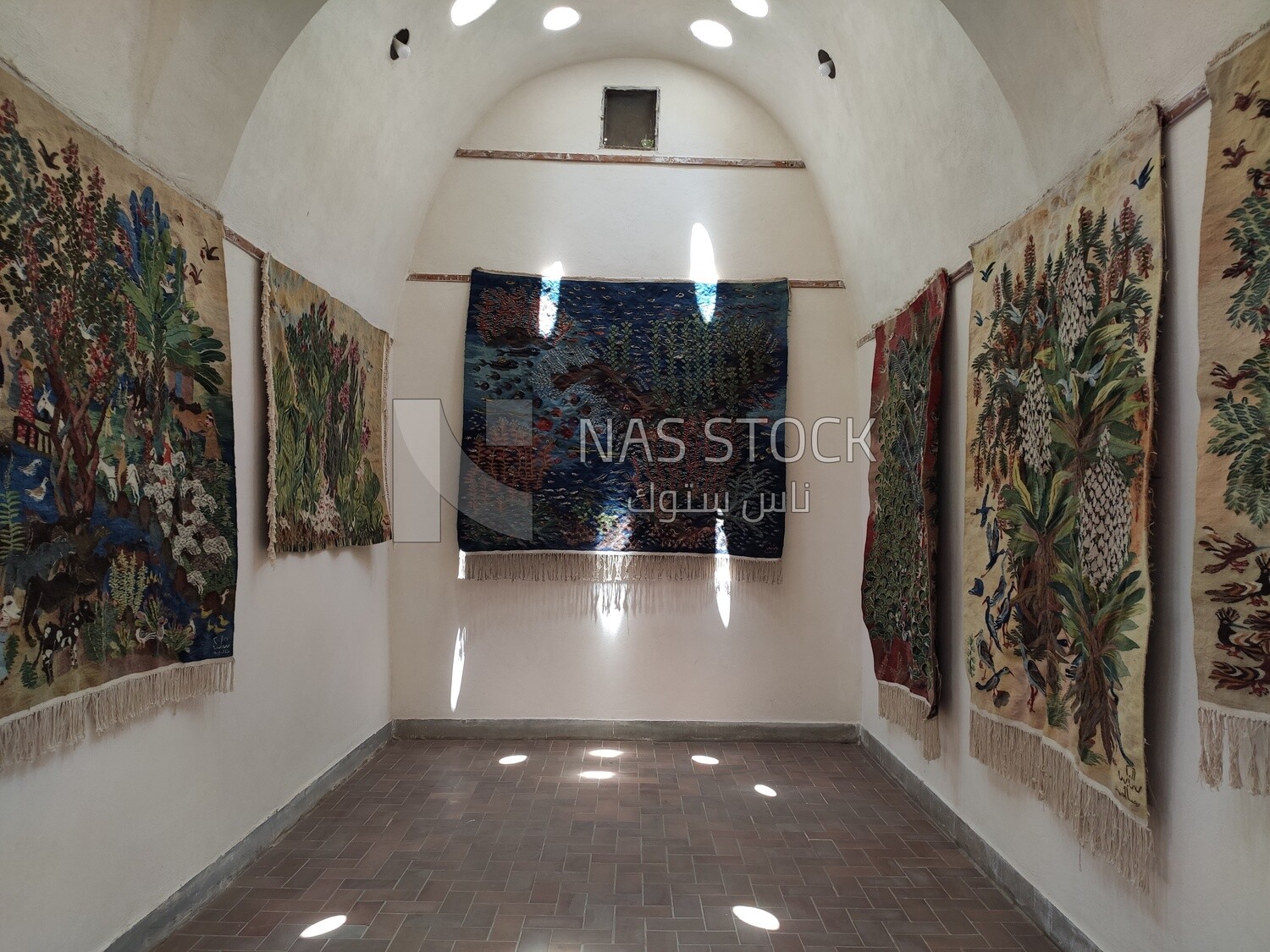 Group of wall carpets on display inside the Ramses Wissa Wassef Centre