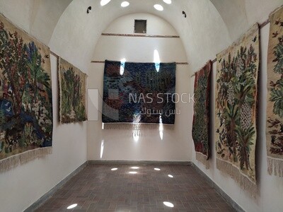 Group of wall carpets on display inside the Ramses Wissa Wassef Centre