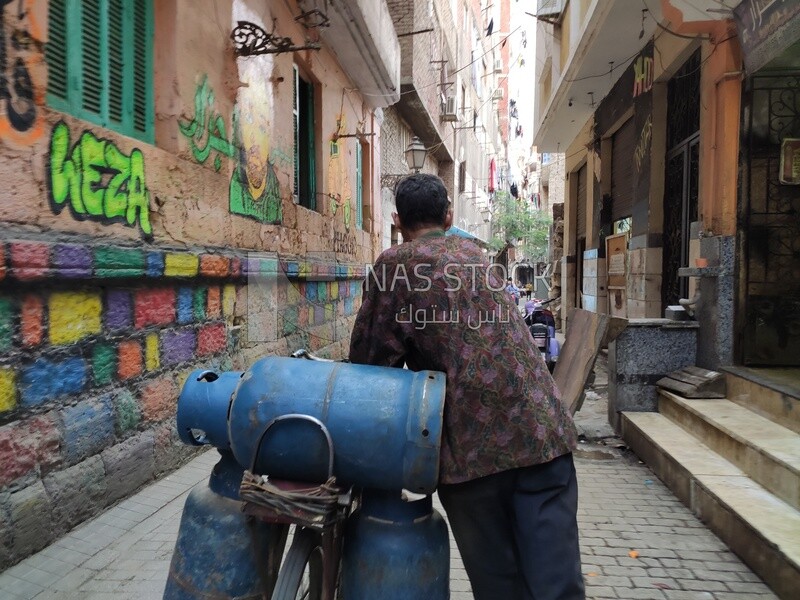 Gas pipe seller in a street in the city of the dead, Egypt