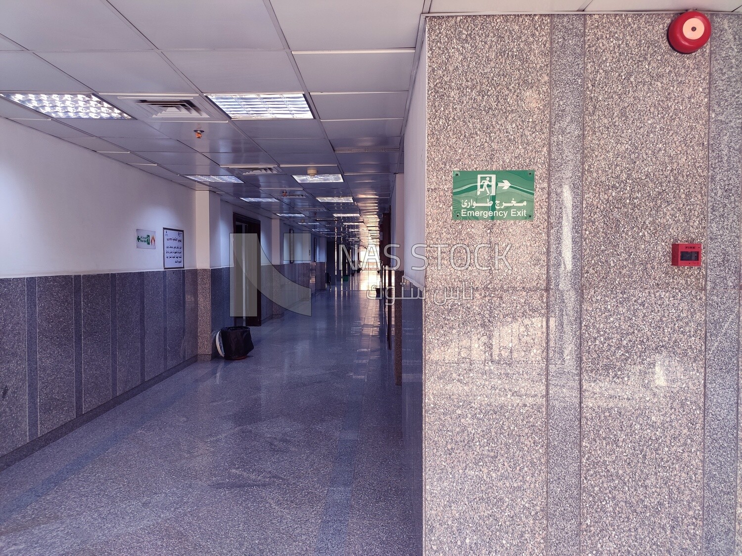 Marble corridor containing many rooms and halls