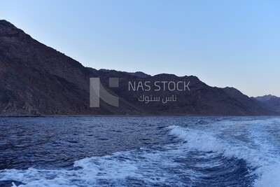 Red Sea mountains overlooking the waters of the Red Sea at sunrise