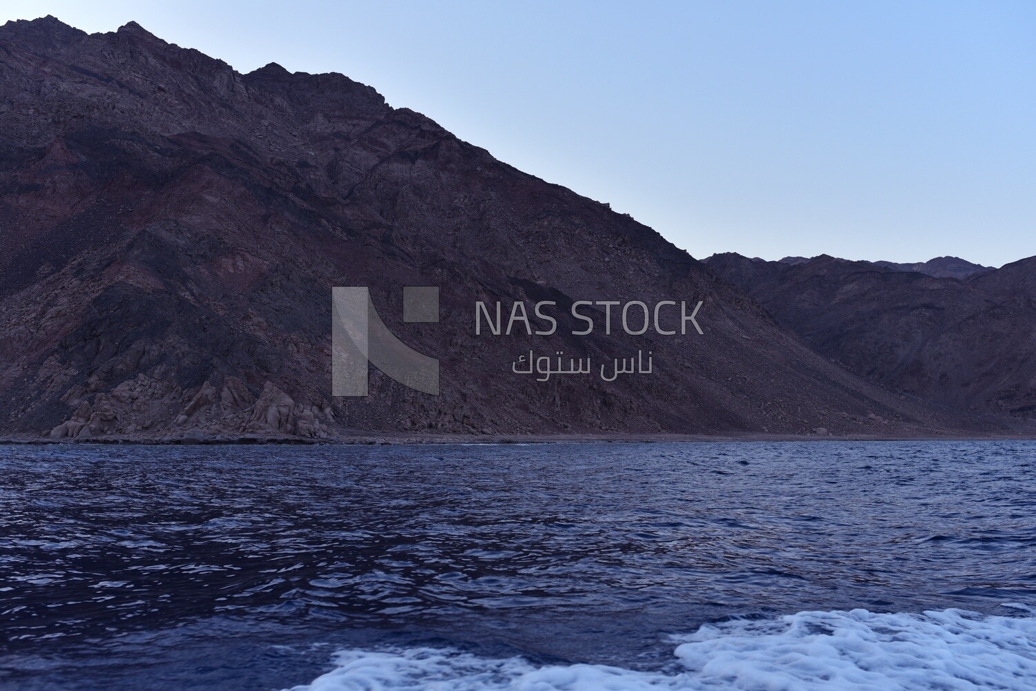 Coastline of the red sea and the mountains in the background. egypt