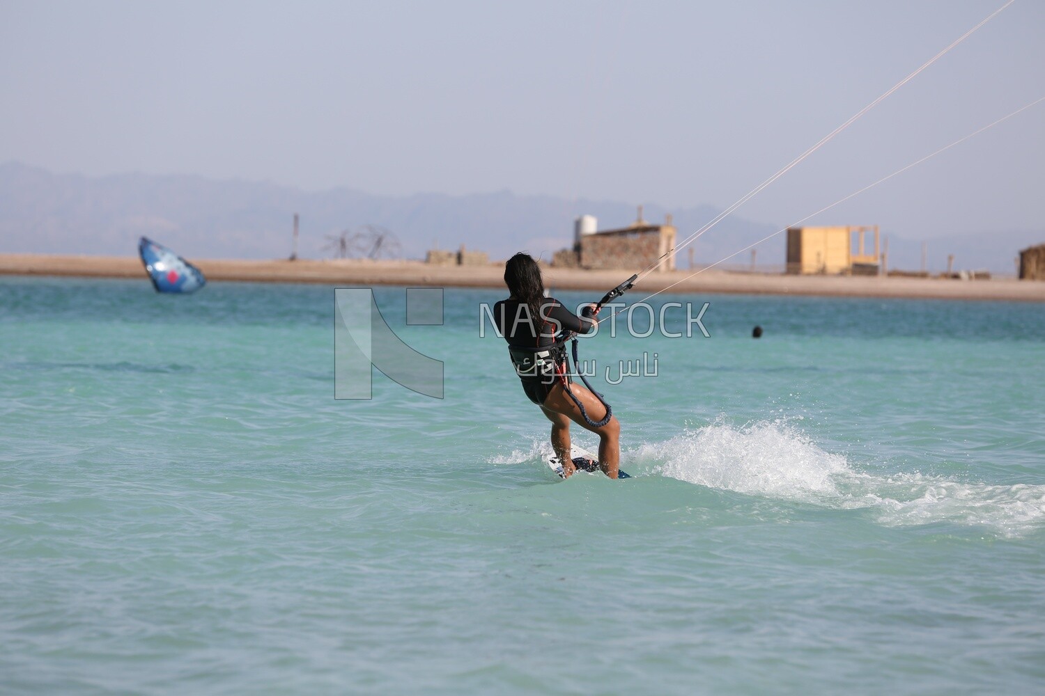 Girl enjoys water skiing in the Red Sea