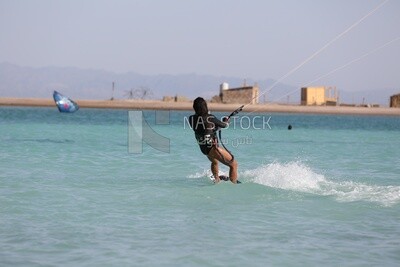 Girl enjoys water skiing in the Red Sea