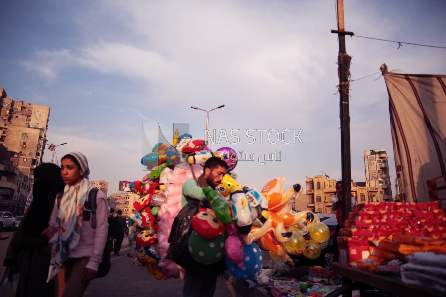Boy selling balloons in the street, Sayeda Zainab, Ramadan Kareem