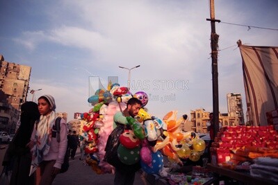 Boy selling balloons in the street, Sayeda Zainab, Ramadan Kareem
