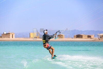 Young man enjoys water skiing