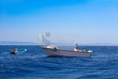 Boats cruising in the Red Sea near Dahab, Egypt