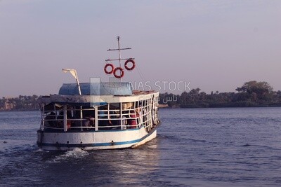 Small ferry boat with people crossing the river, crossing river, calm river, landscapes, ships and fishing boats, nature background