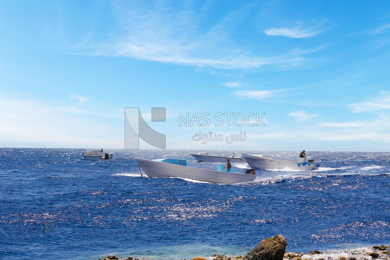 Boats cruising in the Red Sea near Dahab, Egypt
