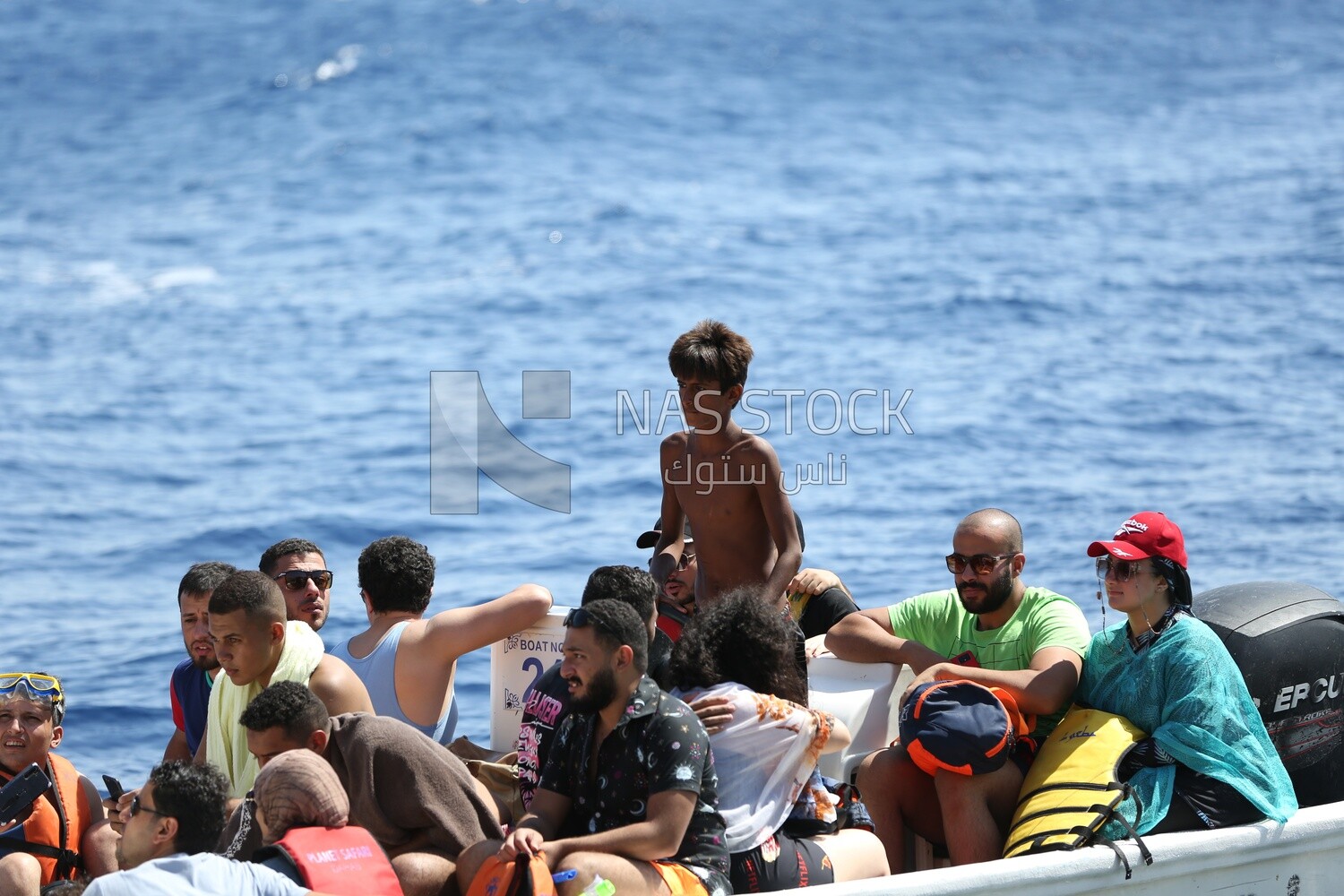 Boat carrying a group of people