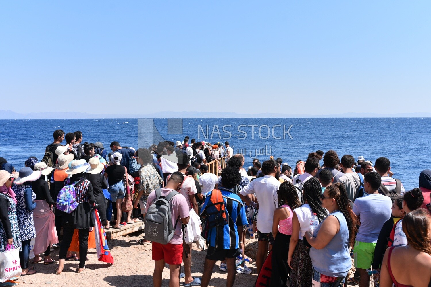 Beach crowded with holidayers