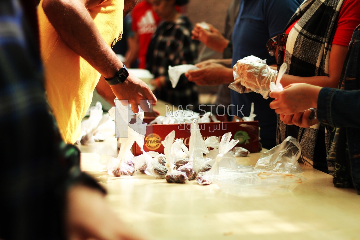 View of people in Matareya sharing their iftar together in the street, Ramadan Kareem, preparing their iftar