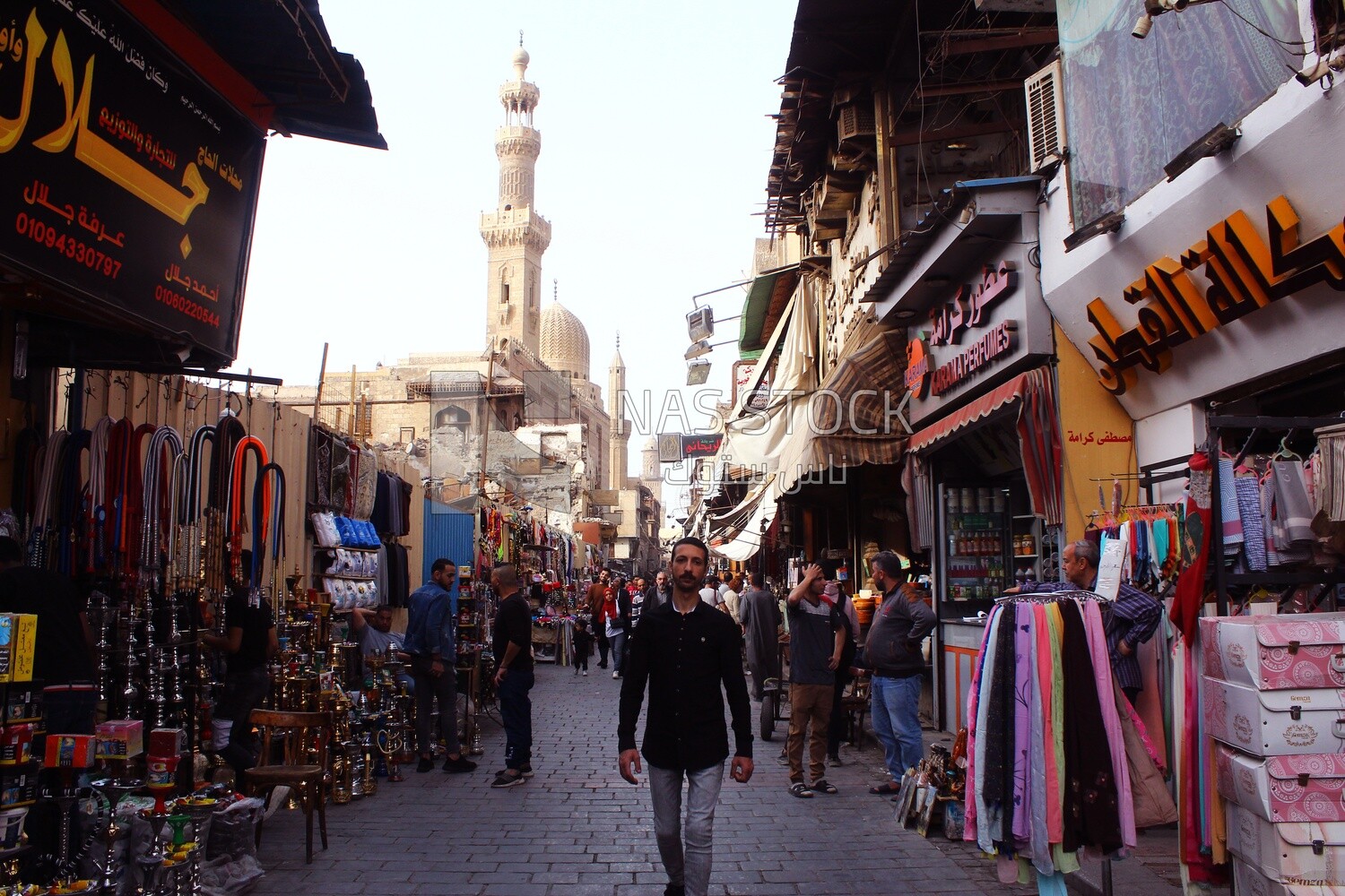 People walking in the street, Ramadan Kareem